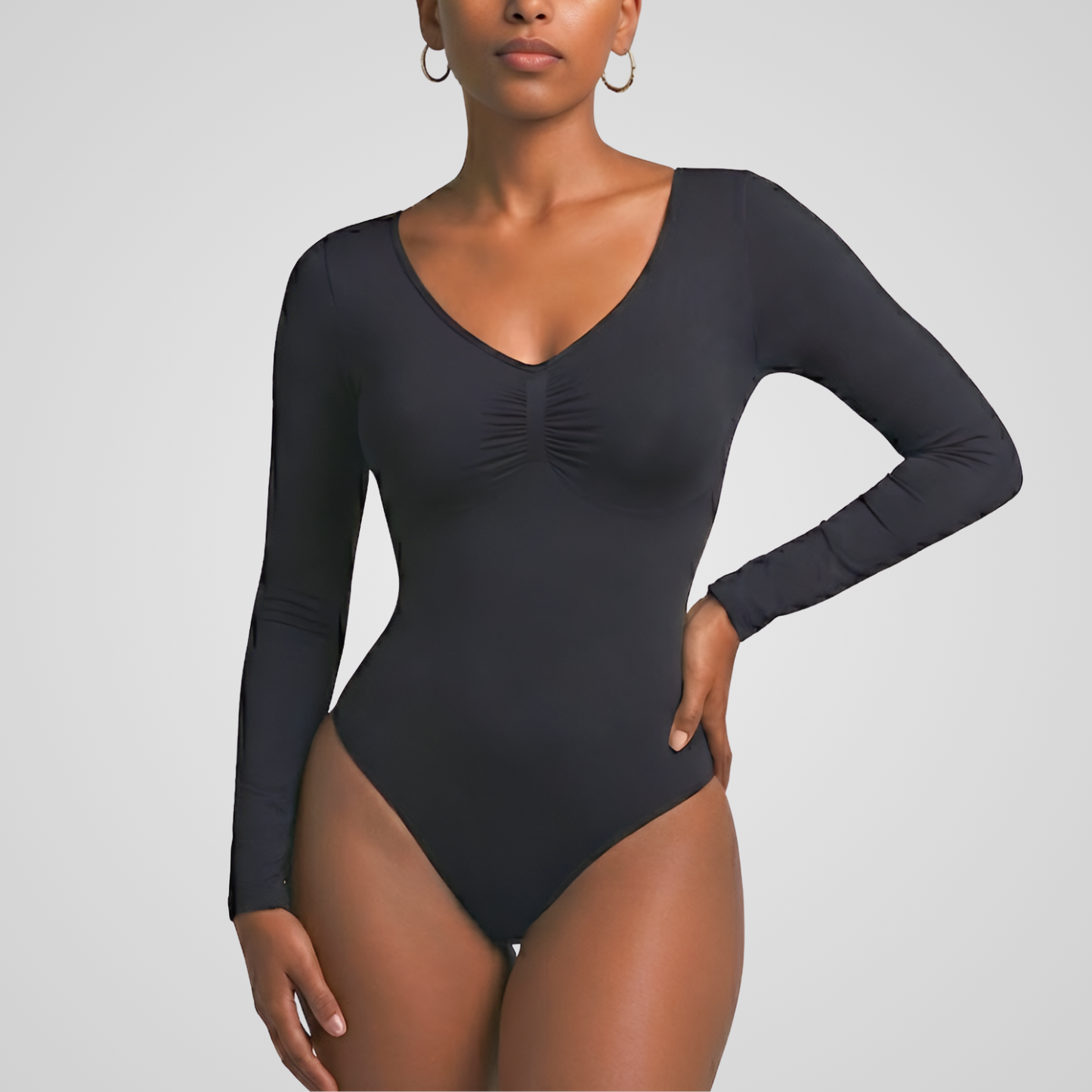Seamless long-sleeve thong bodysuit with tummy control